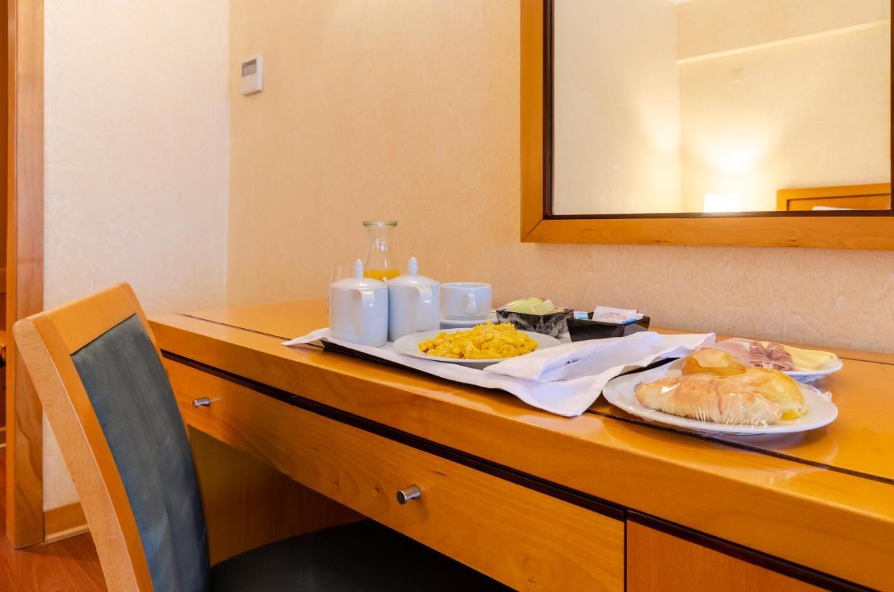 Hotel Roma Lisbon Bagian luar foto
