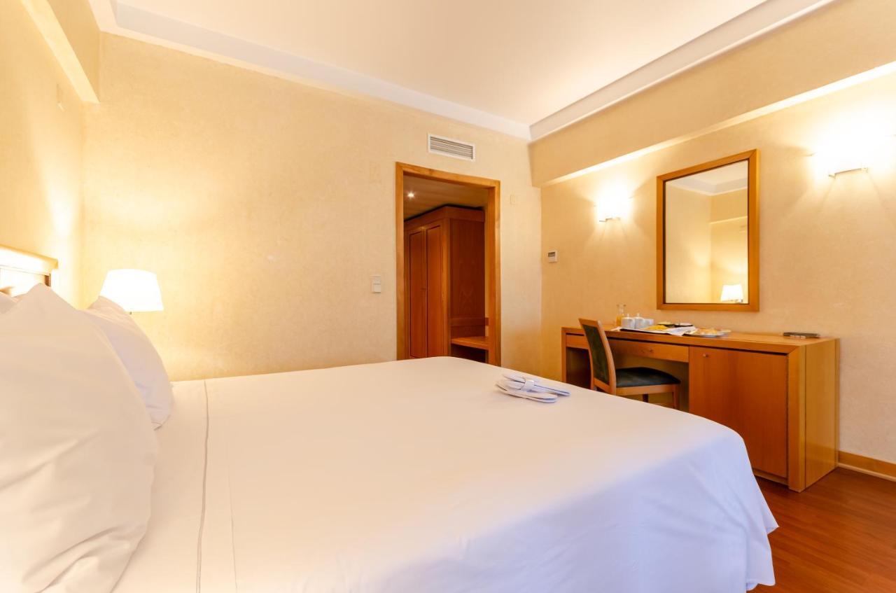 Hotel Roma Lisbon Bagian luar foto