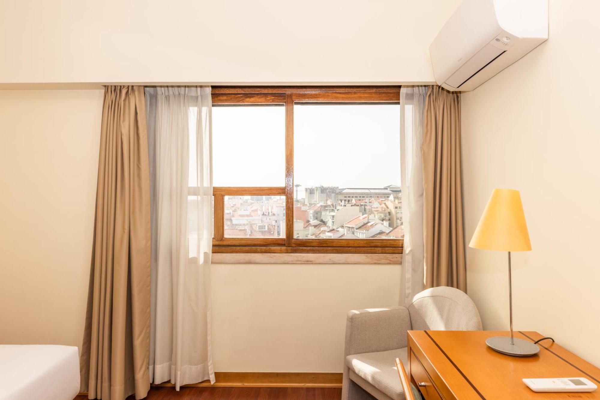 Hotel Roma Lisbon Bagian luar foto